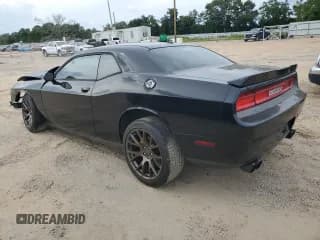 ✅ 2013 Dodge Challenger SXT • VIN: 2C3CDYAG7DH734202 • Lot: 68689034. Wystawiony na Copart z przebiegiem 107 343 mil. Bezpłatny archiwum sprzedaży aukcyjnych z USA i szczegółowy raport historii pojazdu na DreamBid. Zdjęcie 2.