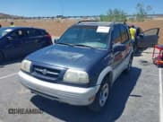 ✅ 2000 Suzuki Grand Vitara JLX • VIN: JS3TD62V2Y4119669 • Lot: 42861312. Wystawiony na IAAI z przebiegiem 168 280 mil. Bezpłatny archiwum sprzedaży aukcyjnych z USA i szczegółowy raport historii pojazdu na DreamBid. Zdjęcie 2.