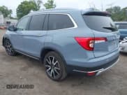 ✅ 2022 Honda Pilot Touring 7-Passenger • VIN: 5FNYF6H68NB056077 • Lot: 42357338. Listed on IAAI with 18,193 mi. Free auction sales archive from the USA and detailed vehicle history report at DreamBid. Image 3.