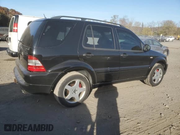 ✅ 2000 Mercedes-Benz M AMG • VIN: 4JGAB74E4YA213337 • Lot: 78241244. Listed on Copart with 159,530 mi. Free auction sales archive from the USA and detailed vehicle history report at DreamBid. Image 3.