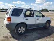 ✅ 2003 Ford Escape XLT Popular • VIN: 1FMYU03143KE07576 • Lot: 68651665. Listed on Copart with 297,008 mi. Free auction sales archive from the USA and detailed vehicle history report at DreamBid. Image 3.