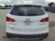 2013 Hyundai Santa Fe Sport z VIN 5XYZW3LA5DG052588, wystawiony jako Copart lot #70262165 z przebiegiem 174 038 mil mil oraz Szkoda całkowita • Salvage title. Historia ofert i sprzedaży dostępna na DreamBid. Obrazek 6.