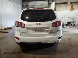 ✅ 2011 Hyundai Santa Fe SE • VIN: 5XYZH4AG7BG085550 • Lot: 64017584. Listed on Copart with 168,239 mi. Free auction sales archive from the USA and detailed vehicle history report at DreamBid. Image 6.