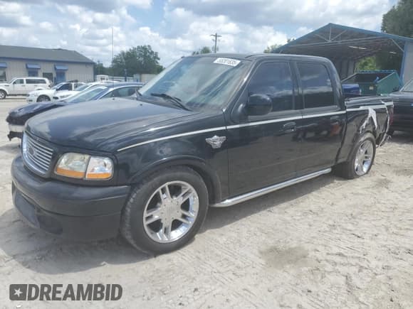 ✅ 2003 Ford F-150 Harley-Davidson • VIN: 1FTRW07393KC28559 • Lot: 55201835. Listed on Copart with 139,288 mi. Free auction sales archive from the USA and detailed vehicle history report at DreamBid. Image 1.