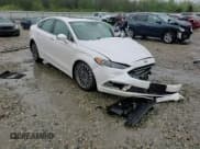 ✅ 2018 Ford Fusion Titanium • VIN: 3FA6P0D90JR247220 • Лот: 80492255. Опубликован ранее на Copart с пробегом Не указан. Бесплатный доступ к архиву аукционных продаж из США и подробный отчёт об истории автомобиля на DreamBid. Изображение 11.