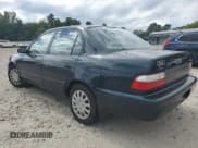 ✅ 1997 Toyota Corolla • VIN: 2T1BA02E7VC180783 • Lot: 80870685. Wystawiony na Copart z przebiegiem 121 627 mil. Bezpłatny archiwum sprzedaży aukcyjnych z USA i szczegółowy raport historii pojazdu na DreamBid. Zdjęcie 2.