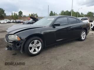 2013 Dodge Charger SE with VIN 2C3CDXBG5DH636990, listed as a Copart auction lot 82334525 with 281,133 mi miles and Salvage title. Bid and sale history available at DreamBid. Image 1.