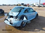 ✅ 2012 Volkswagen Beetle 2.5L • VIN: 3VWJX7AT0CM614269 • Lot: 43772516. Listed on IAAI with 129,147 mi. Free auction sales archive from the USA and detailed vehicle history report at DreamBid. Image 4.