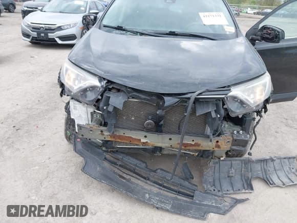 ✅ 2018 Toyota RAV4 LE • VIN: 2T3BFREVXJW763690 • Lot: 42171331. Listed on IAAI with 133,428 mi. Free auction sales archive from the USA and detailed vehicle history report at DreamBid. Image 6.