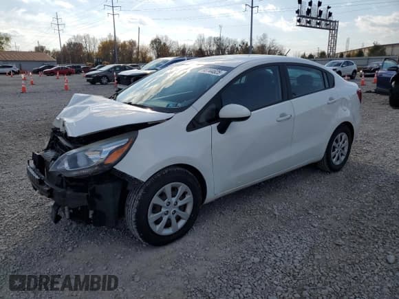 ✅ 2016 Kia Rio LX • VIN: KNADM4A34G6599138 • Лот: 90744625. Опубликован ранее на Copart с пробегом 166 564 миль. Бесплатный доступ к архиву аукционных продаж из США и подробный отчёт об истории автомобиля на DreamBid. Изображение 1.