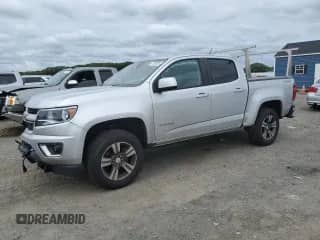 2018 Chevrolet Colorado 4WD Work Truck with VIN 1GCGTBEN9J1121613, listed as a Copart auction lot 71680335 with 76,617 mi miles and Salvage title. Bid and sale history available at DreamBid. Image 1.