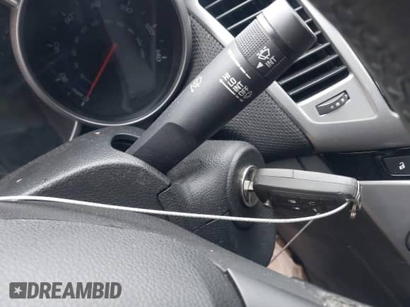 2014 Chevrolet Cruze 1LT z VIN 1G1PC5SB2E7401106, wystawiony jako IAAI lot #43573350 z przebiegiem 108 498 mil mil oraz . Historia ofert i sprzedaży dostępna na DreamBid. Obrazek 11.