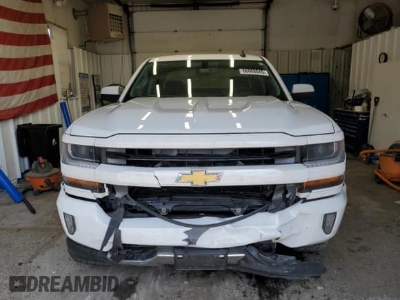 ✅ 2016 Chevrolet Silverado 1500 LT • VIN: 1GCVKREC0GZ120796 • Лот: 66868045. Опубликован ранее на Copart с пробегом 186 092 миль. Бесплатный доступ к архиву аукционных продаж из США и подробный отчёт об истории автомобиля на DreamBid. Изображение 5.