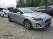 ✅ 2020 Ford Fusion Titanium • VIN: 3FA6P0RU3LR141487 • Lot: 71906835. Listed on Copart with 67,307 mi. Free auction sales archive from the USA and detailed vehicle history report at DreamBid. Image 4.