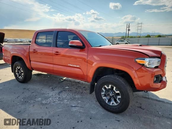 ✅ 2017 Toyota Tacoma TRD Sport • VIN: 3TMCZ5AN1HM051977 • Lot: 68040475. Listed on Copart with 103,715 mi. Free auction sales archive from the USA and detailed vehicle history report at DreamBid. Image 4.