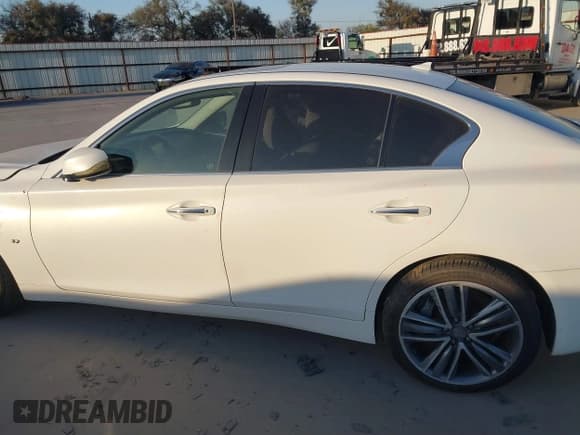 ✅ 2015 Infiniti Q50 Premium • VIN: JN1BV7AP1FM336842 • Lot: 40893482. Wystawiony na IAAI z przebiegiem 96 634 mil. Bezpłatny archiwum sprzedaży aukcyjnych z USA i szczegółowy raport historii pojazdu na DreamBid. Zdjęcie 14.