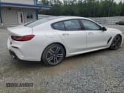 ✅ 2022 BMW 8 Series 840i • VIN: WBAGV4C03NCH43079 • Лот: 59799665. Опубликован ранее на Copart с пробегом 28 069 миль. Бесплатный доступ к архиву аукционных продаж из США и подробный отчёт об истории автомобиля на DreamBid. Изображение 3.