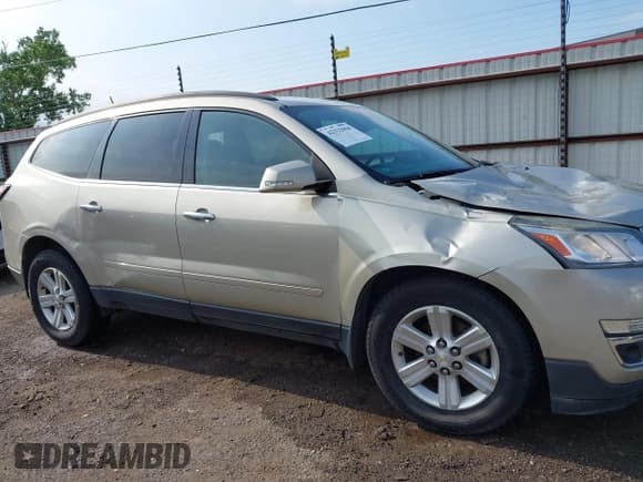 ✅ 2014 Chevrolet Traverse LT • VIN: 1GNKRHKD7EJ169048 • Lot: 42332958. Listed on IAAI with 184,819 mi. Free auction sales archive from the USA and detailed vehicle history report at DreamBid. Image 13.
