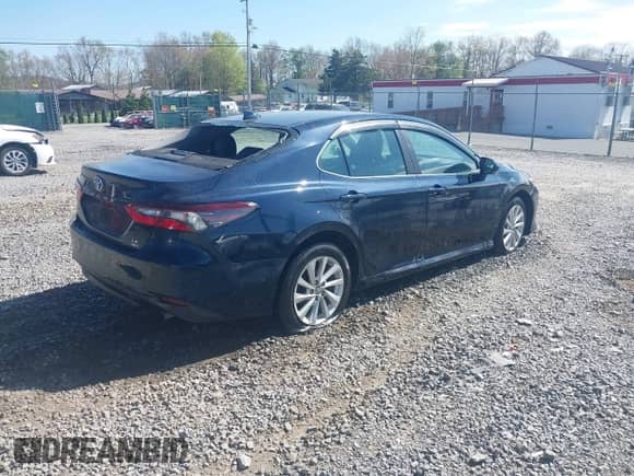 2021 Toyota Camry LE с VIN 4T1C11BK1MU044212, выставлен на аукционе IAAI как лот 42133279 с пробегом 48 591 миль миль и . История ставок и продаж доступна на DreamBid. Изображение 4.