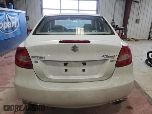 ✅ 2012 Suzuki Kizashi S • VIN: JS2RF9A1XC6100146 • Лот: 77344604. Опубликован ранее на Copart с пробегом 196 538 миль. Бесплатный доступ к архиву аукционных продаж из США и подробный отчёт об истории автомобиля на DreamBid. Изображение 6.