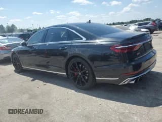 ✅ 2022 Audi S8 • VIN: WAULSAF8XNN001626 • Лот: 63004565. Опубликован ранее на Copart с пробегом 42 717 миль. Бесплатный доступ к архиву аукционных продаж из США и подробный отчёт об истории автомобиля на DreamBid. Изображение 2.