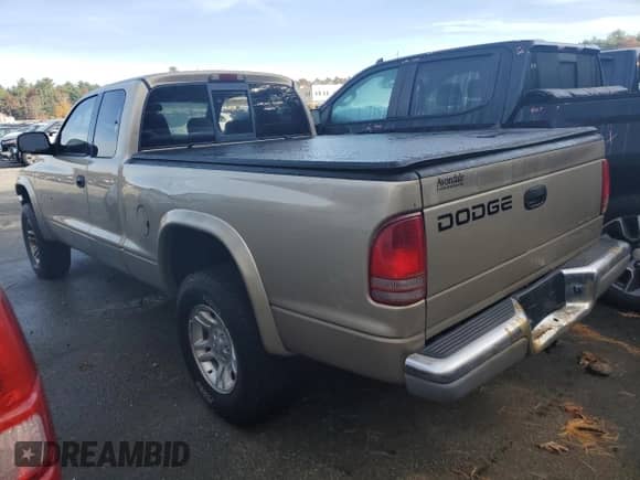 2002 Dodge Dakota SLT с VIN 1B7GG42N62S675417, выставлен на аукционе Copart как лот 77532914 с пробегом 133 142 миль миль и Чистый • Clean title. История ставок и продаж доступна на DreamBid. Изображение 2.