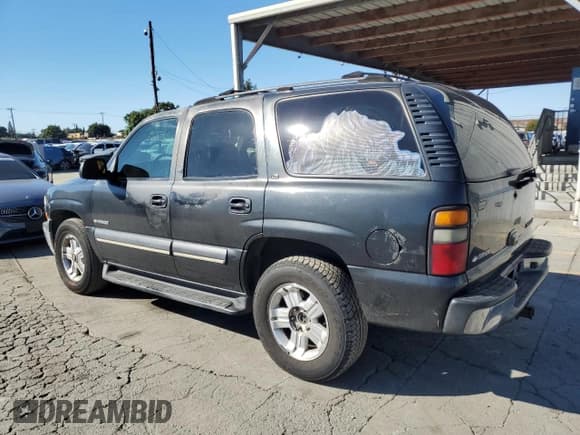 ✅ 2003 Chevrolet Tahoe LS • VIN: 1GNEC13ZX3R130663 • Lot: 82402255. Listed on Copart with 184,373 mi. Free auction sales archive from the USA and detailed vehicle history report at DreamBid. Image 2.