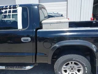 ✅ 2004 Dodge Dakota Sport • VIN: 1D7HG38N54S770100 • Lot: 42384350. Wystawiony na IAAI z przebiegiem 156 645 mil. Bezpłatny archiwum sprzedaży aukcyjnych z USA i szczegółowy raport historii pojazdu na DreamBid. Zdjęcie 6.