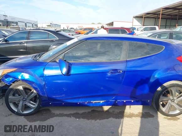 2014 Hyundai Veloster Turbo z VIN KMHTC6AE4EU184467, wystawiony jako IAAI lot #43457856 z przebiegiem 149 546 mil mil oraz . Historia ofert i sprzedaży dostępna na DreamBid. Obrazek 15.