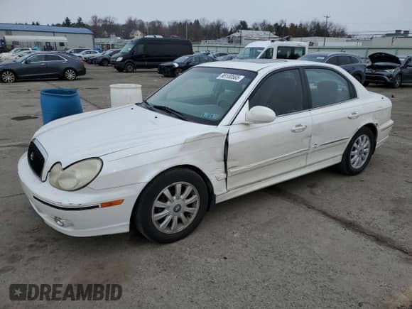 2003 Hyundai Sonata GLS с VIN KMHWF35HX3A903193, выставлен на аукционе Copart как лот 88100565 с пробегом 106 309 миль миль и Списание • Salvage title. История ставок и продаж доступна на DreamBid. Изображение 1.