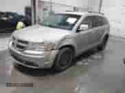 2009 Dodge Journey SE z VIN 3D4GG47B99T561583, wystawiony jako IAAI lot #43402002 z przebiegiem 137 189 mil mil oraz . Historia ofert i sprzedaży dostępna na DreamBid. Obrazek 2.