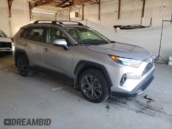 ✅ 2022 Toyota RAV4 Hybrid Limited • VIN: JTMD6RFV5NJ014887 • Lot: 80272175. Listed on Copart with 80,114 mi. Free auction sales archive from the USA and detailed vehicle history report at DreamBid. Image 4.