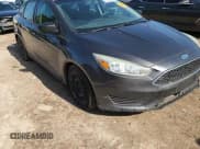 ✅ 2015 Ford Focus S • VIN: 1FADP3E26FL219678 • Лот: 61764605. Опубликован ранее на Copart с пробегом 122 893 миль. Бесплатный доступ к архиву аукционных продаж из США и подробный отчёт об истории автомобиля на DreamBid. Изображение 13.