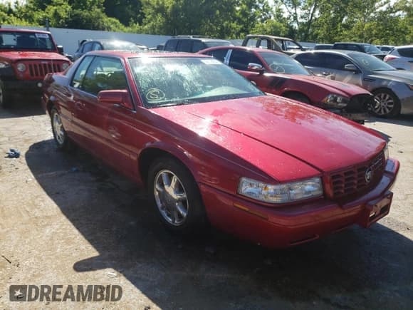 ✅ 2000 Cadillac Eldorado Touring ETC • VIN: 1G6ET129XYU191433 • Lot: 58108224. Listed on Copart with 76,957 mi. Free auction sales archive from the USA and detailed vehicle history report at DreamBid. Image 4.