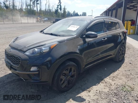 ✅ 2021 Kia Sportage S • VIN: KNDP6CAC8M7896679 • Лот: 42994171. Опубликован ранее на IAAI с пробегом 76 083 миль. Бесплатный доступ к архиву аукционных продаж из США и подробный отчёт об истории автомобиля на DreamBid. Изображение 2.