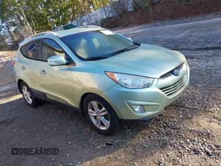 2013 Hyundai Tucson Limited with VIN KM8JUCAC2DU582647, listed as a IAAI auction lot 43422083 with 145,178 mi miles and . Bid and sale history available at DreamBid. Image 1.