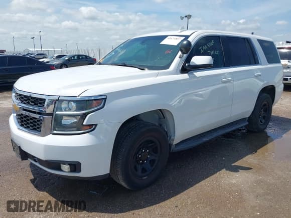 ✅ 2016 Chevrolet Tahoe Commercial • VIN: 1GNLCDEC5GR228457 • Lot: 42671897. Listed on IAAI with 127,987 mi. Free auction sales archive from the USA and detailed vehicle history report at DreamBid. Image 2.