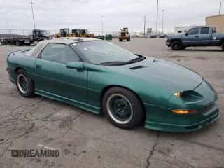 1997 Chevrolet Camaro z VIN 2G1FP32K5V2124866, wystawiony jako Copart lot #86287254 z przebiegiem 84 997 mil mil oraz Szkoda całkowita • Salvage title. Historia ofert i sprzedaży dostępna na DreamBid. Obrazek 4.