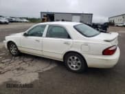 ✅ 2001 Mazda 626 LX • VIN: 1YVGF22C515251837 • Lot: 56854605. Listed on Copart with 173,148 mi. Free auction sales archive from the USA and detailed vehicle history report at DreamBid. Image 2.