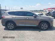 ✅ 2020 Hyundai Santa Fe SEL • VIN: 5NMS33AD3LH261307 • Lot: 42940601. Listed on IAAI with 95,444 mi. Free auction sales archive from the USA and detailed vehicle history report at DreamBid. Image 13.