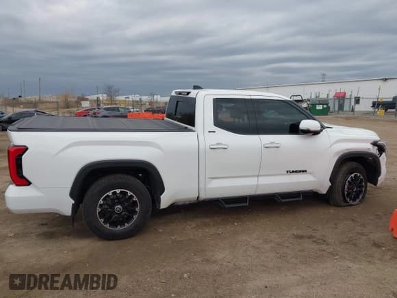 ✅ 2022 Toyota Tundra SR5 • VIN: 5TFLA5DA5NX005641 • Lot: 41833447. Listed on IAAI with 35,440 mi. Free auction sales archive from the USA and detailed vehicle history report at DreamBid. Image 13.