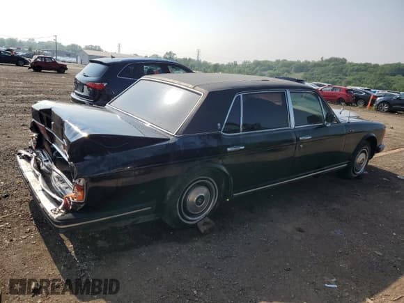 ✅ 1984 Rolls-Royce Silver Spur • VIN: SCAZN42A1ECX09880 • Лот: 59385045. Опубликован ранее на Copart с пробегом 74 013 миль. Бесплатный доступ к архиву аукционных продаж из США и подробный отчёт об истории автомобиля на DreamBid. Изображение 3.