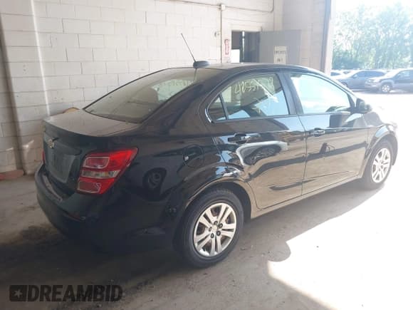 ✅ 2017 Chevrolet Sonic LS • VIN: 1G1JB5SG5H4124641 • Lot: 42551578. Listed on IAAI with 107,431 mi. Free auction sales archive from the USA and detailed vehicle history report at DreamBid. Image 4.