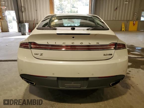 ✅ 2015 Lincoln MKZ • VIN: 3LN6L2J92FR607094 • Lot: 82484395. Wystawiony na Copart z przebiegiem 120 430 mil. Bezpłatny archiwum sprzedaży aukcyjnych z USA i szczegółowy raport historii pojazdu na DreamBid. Zdjęcie 6.