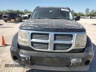 2007 Dodge Nitro SLT с VIN 1D8GT58K17W736155, выставлен на аукционе Copart как лот 77836074 с пробегом 215 541 миль миль и Списание • Salvage title. История ставок и продаж доступна на DreamBid. Изображение 5.