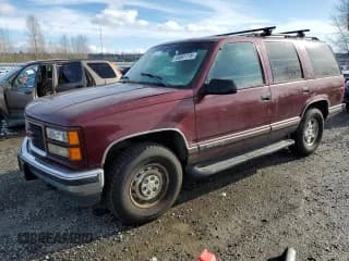 ✅ 1998 GMC Yukon • VIN: 1GKEK13R4WJ719517 • Lot: 44651715. Listed on Copart with 230,062 mi. Free auction sales archive from the USA and detailed vehicle history report at DreamBid. Image 1.