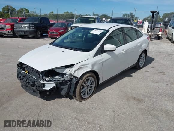✅ 2018 Ford Focus SE • VIN: 1FADP3F21JL225220 • Лот: 43670473. Опубликован ранее на IAAI с пробегом 125 394 миль. Бесплатный доступ к архиву аукционных продаж из США и подробный отчёт об истории автомобиля на DreamBid. Изображение 2.