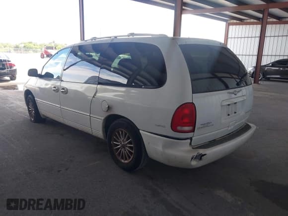 ✅ 2000 Chrysler Town & Country Limited • VIN: 1C4GP64L9YB647675 • Lot: 43125815. Listed on IAAI with 70,615 mi. Free auction sales archive from the USA and detailed vehicle history report at DreamBid. Image 3.