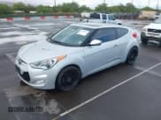 ✅ 2013 Hyundai Veloster w/Black Int • VIN: KMHTC6AD4DU163477 • Lot: 43326835. Wystawiony na IAAI z przebiegiem 109 212 mil. Bezpłatny archiwum sprzedaży aukcyjnych z USA i szczegółowy raport historii pojazdu na DreamBid. Zdjęcie 2.
