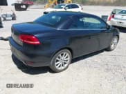 ✅ 2016 Volkswagen Eos Komfort • VIN: WVWBW8AH4GV000400 • Lot: 42123528. Wystawiony na IAAI z przebiegiem 77 983 mil. Bezpłatny archiwum sprzedaży aukcyjnych z USA i szczegółowy raport historii pojazdu na DreamBid. Zdjęcie 4.